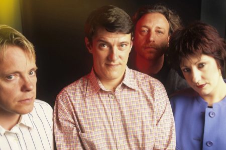 Portada con textura metálica del álbum Brotherhood de New Order